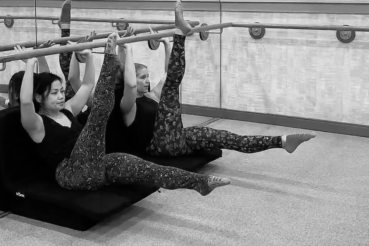 Bar Method students are demonstrating round back.