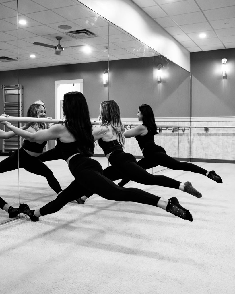 Using the ballet barre to increase strength and flexibility
