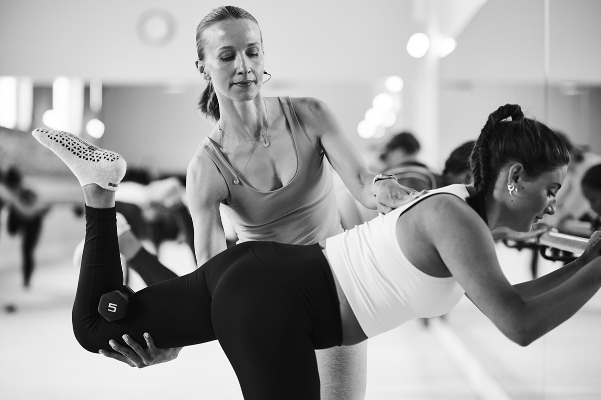 Black and white image of two feet on its toes